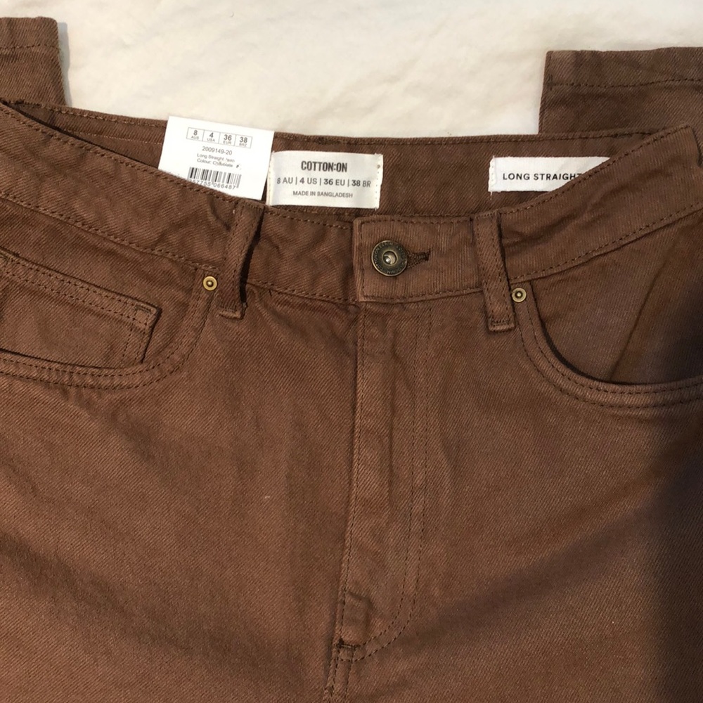 Brand new/Great condition. Brown Long Straight Leg Jeans. Size 4 Brand: CottonOn